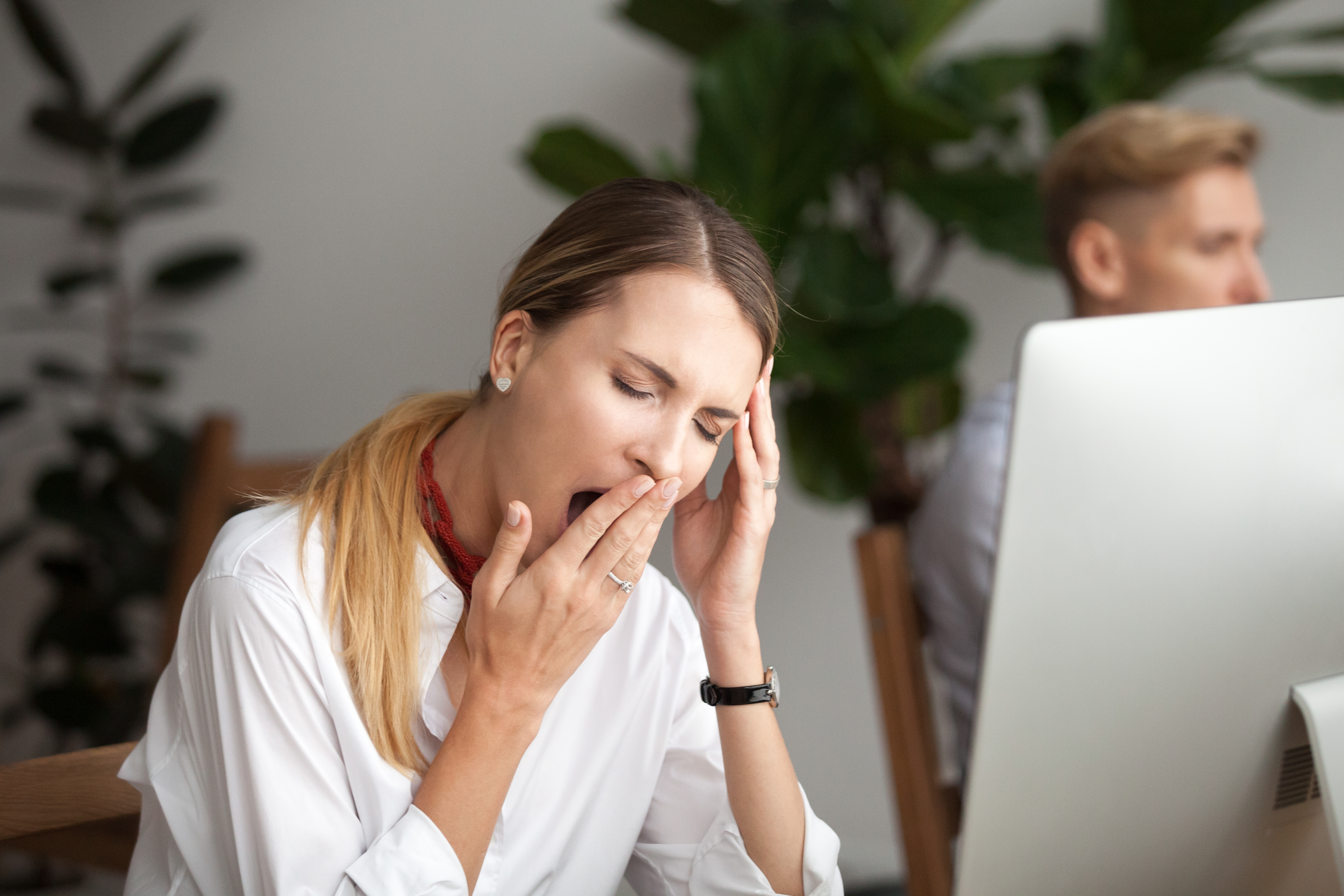 tired woman at work